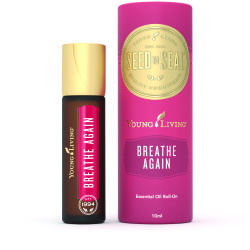 Ätherisches Öl Breathe Again Roll-On mit Verpackung von Young Living, freigestellt vor weissem Hintergrund