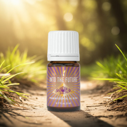 Ätherisches Öl "Into the Future" von Young Living, 5ml Braunglasflasche mit Etikett, dargestellt in der Natur