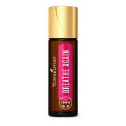 Ätherisches Öl Breathe Again Roll-On mit Verpackung von Young Living, freigestellt vor weißem Hintergrund